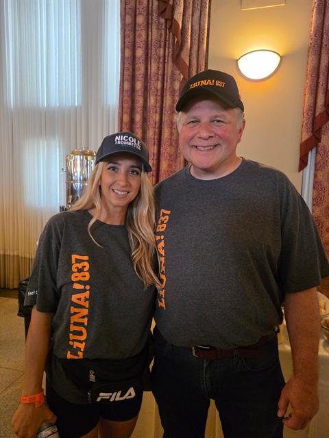 Nicole with a supporter at a community event